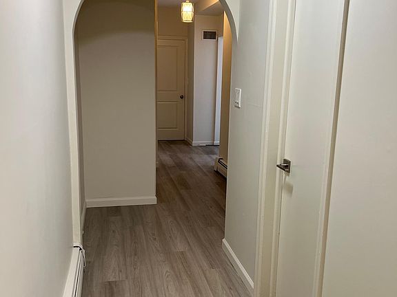 hallway, entrance to bath on right