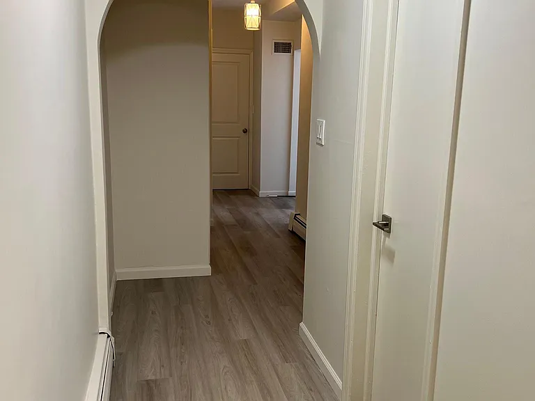 hallway, entrance to bath on right