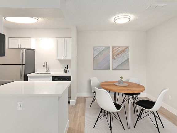 Kitchens features stainless steel appliances and updated cabinetry