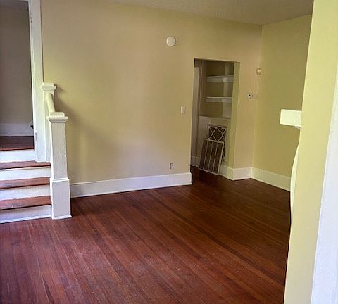 2nd living space showing stairs to upper level