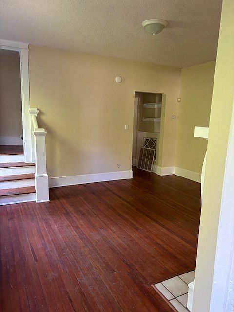 2nd living space showing stairs to upper level