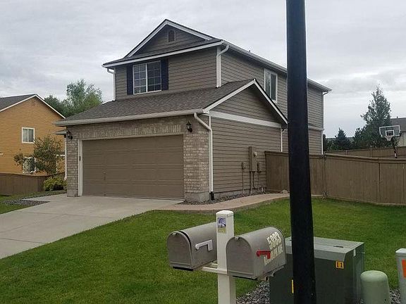 Front of house, 2 car garage