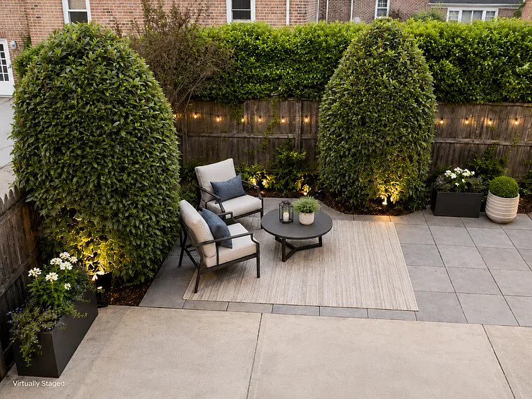 Shared backyard - 2 apartments all together. Virtually staged - all paved, the trees and wooden fence are real. very little maintenance.