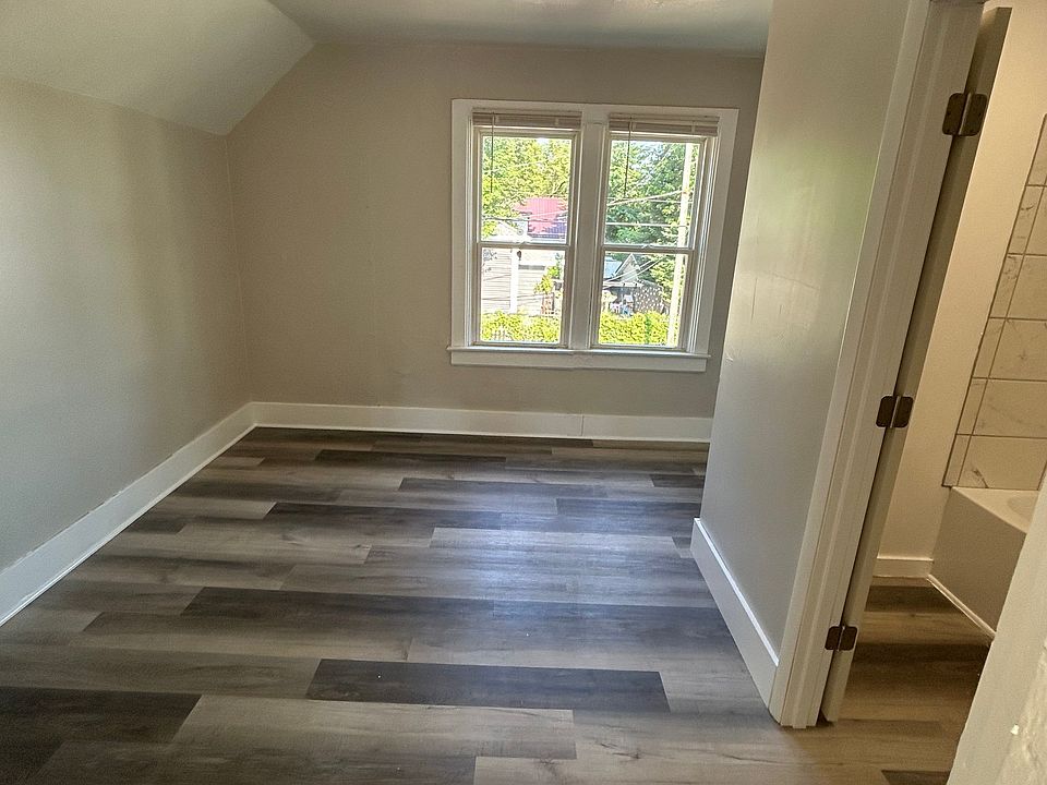 Bedroom with small walk in closet