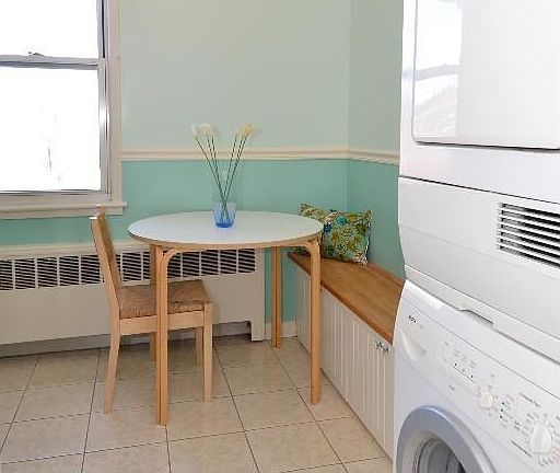 Laundry and Modern Eat-in Kitchen Table