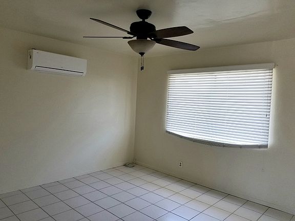 Another angle of the living room with a new mini split (air conditioning and heating) installed