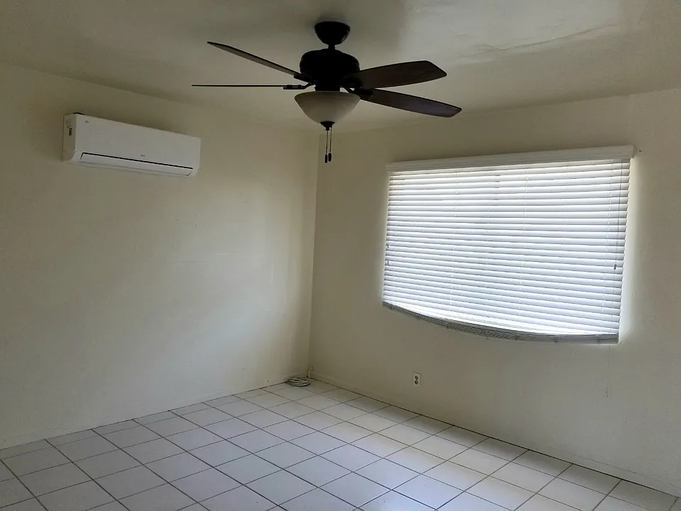 Another angle of the living room with a new mini split (air conditioning and heating) installed