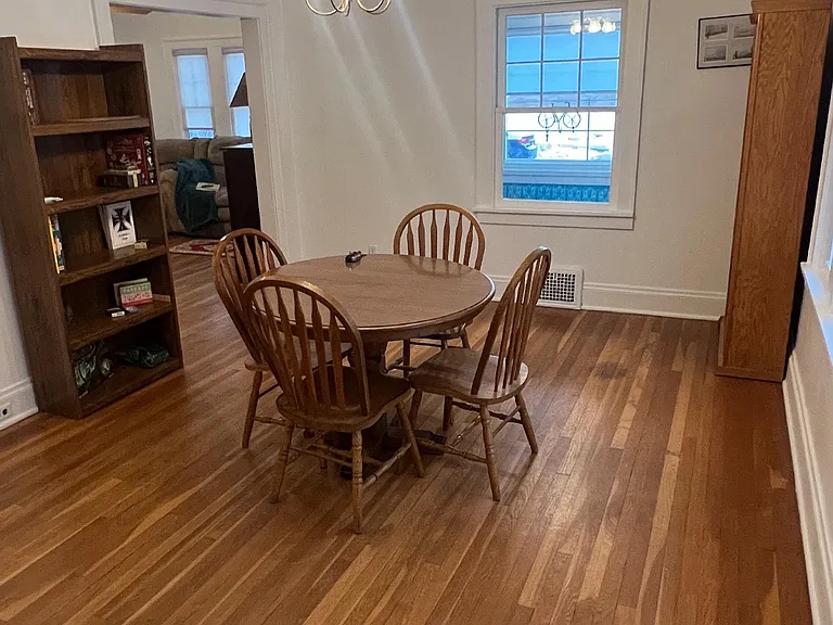 Dining room with books and games