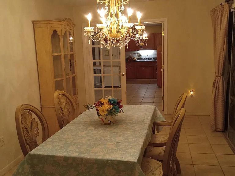 This is a view from the dining room, looking into the kitchen, with one French door closed, so you can have your privacy, (or you can make the dining room into an office or another bedroom?) There is a lot of natural light.