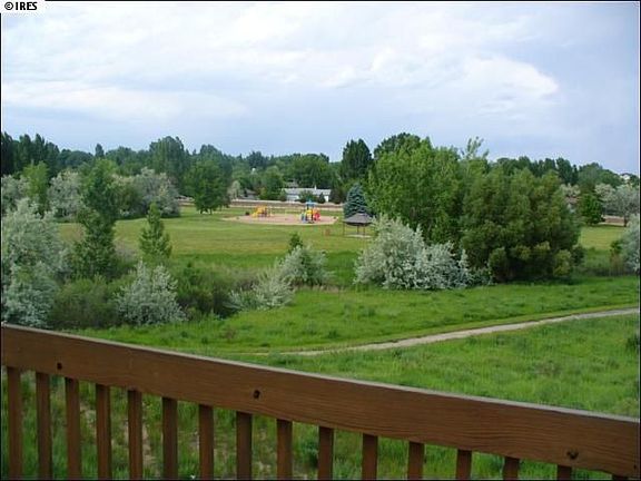 view of park and greenbelt from deck