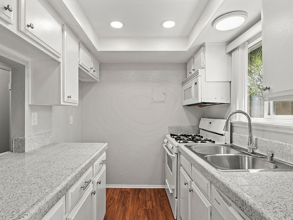 Upgraded Kitchen with White Cabinets
