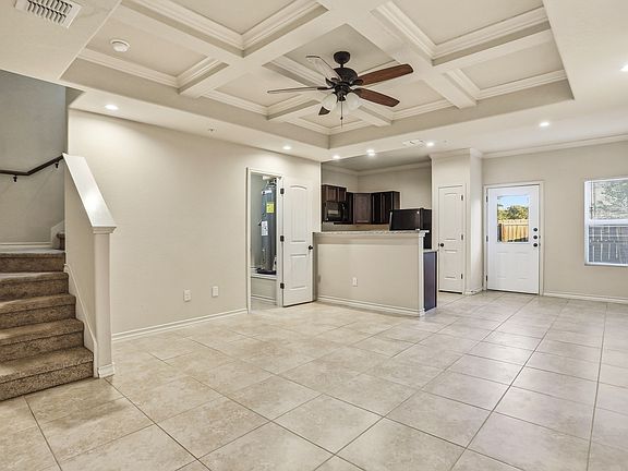 Spacious Living Area with Vaulted Ceilings