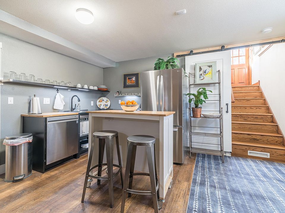 Stairway entrance into kitchenette.