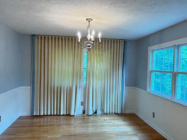 Dining room with two large windows, Frequent sightings of cardinals and hummingbirds!