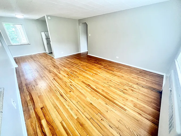 Step into this expansive living space, perfect for modern living and natural light enthusiasts. Step into this expansive living space, perfect for modern living and natural light enthusiasts.