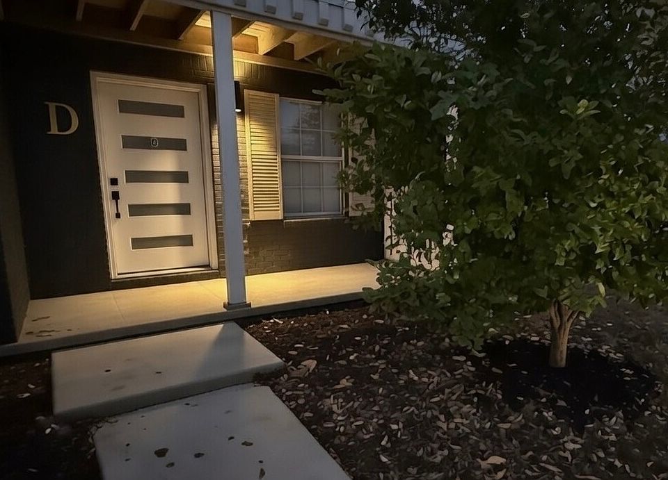 Beautifully remodeled patio and exterior with uplighting and live orange tree right outside your brand new front door!