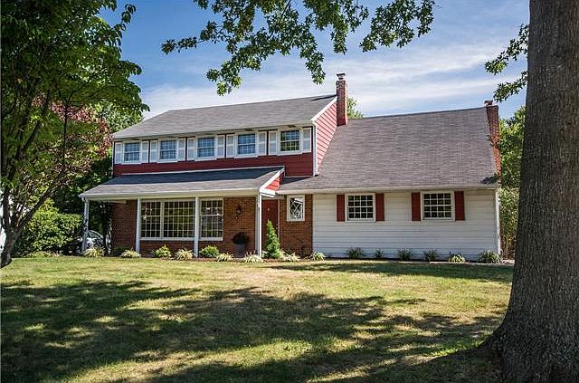 Classic 2-story colonial: 3 BR/2.5 BA + sun porch