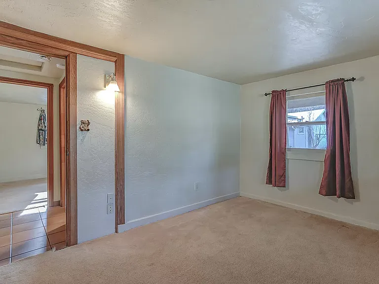 This is a small bedroom at the front of the house and could be used as an office.