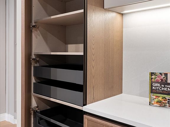 Model Kitchen at Sales Gallery with tons of pantry space