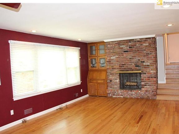 Large Living Room with a beautiful view of the private back yard.