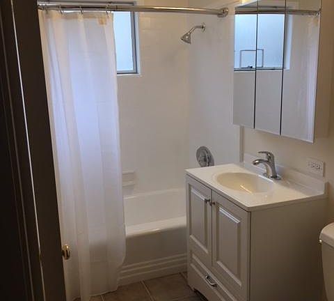 All new fixtures and tile floor in bath