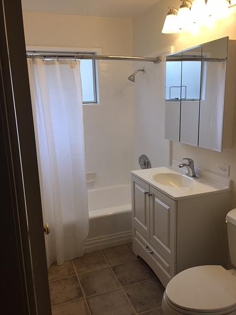 All new fixtures and tile floor in bath