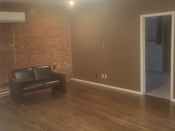 Large living room with solid oak floors