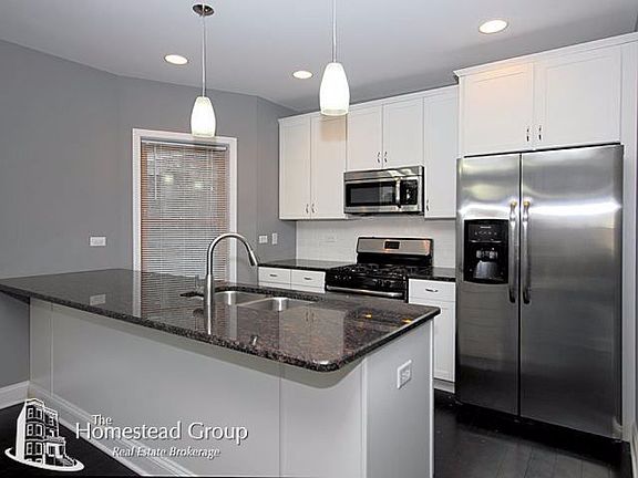 3rd image of 6548 N Campbell Ave #House