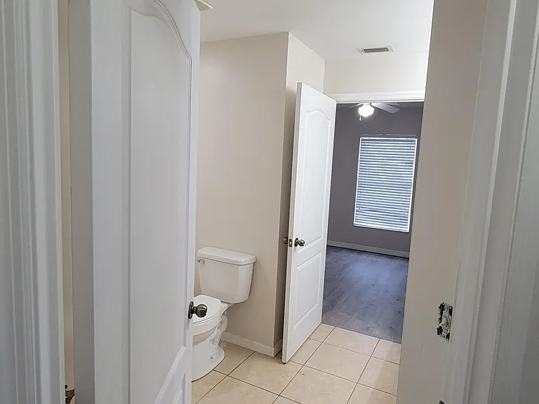 Hallway looking through Jack & Jill Bath into Bedroom 2
