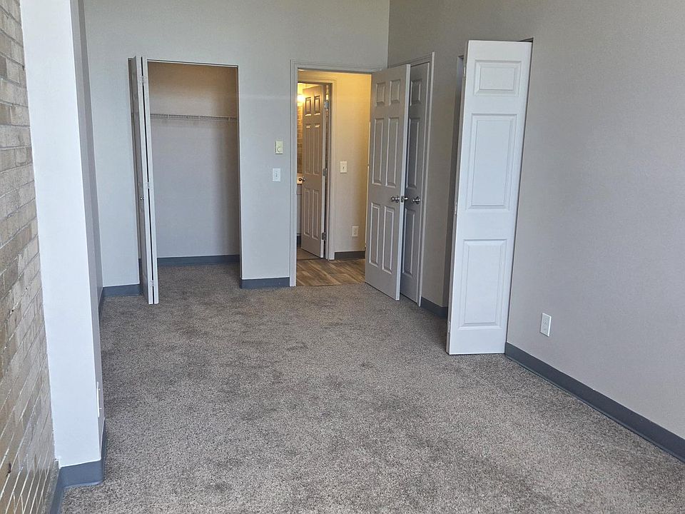 bedroom has 2 shelved closets