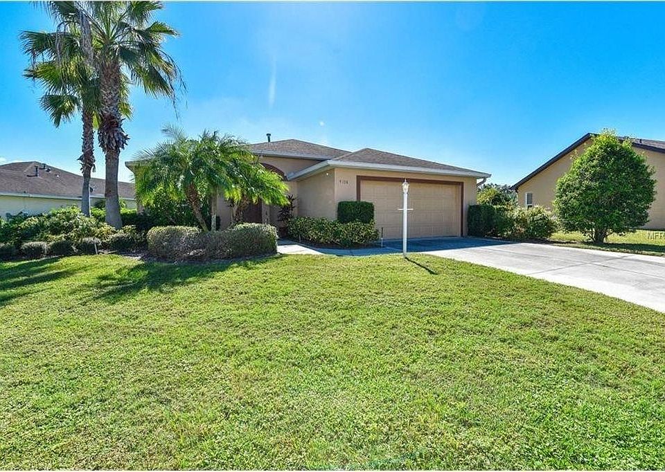 Front entrance, driveway, 2 car garage