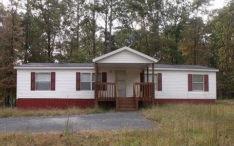 Gently positioned upon a knoll.