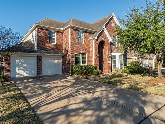 This home offers a 3-car tandem garage and a double-wide driveway - perfect for extra parking needs.