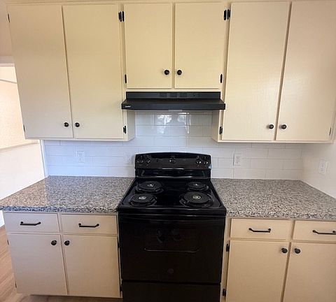 Beautiful kitchen with new counter tops and appliances.