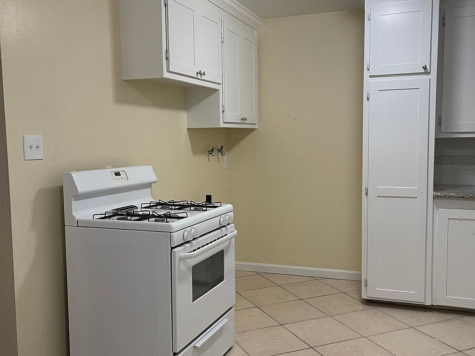 Electric Washing Machine & Gas Dryer hook-ups, in-unit; next to stove