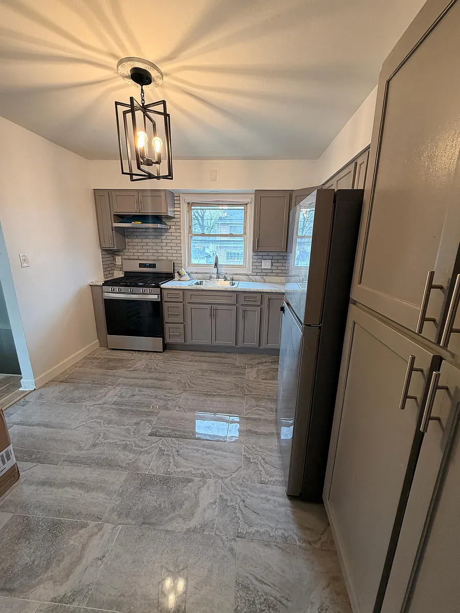 Building Photo - 128-03 Sutter Ave #2