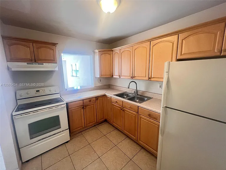12290 NE 11th Ct #203 — Photo 1