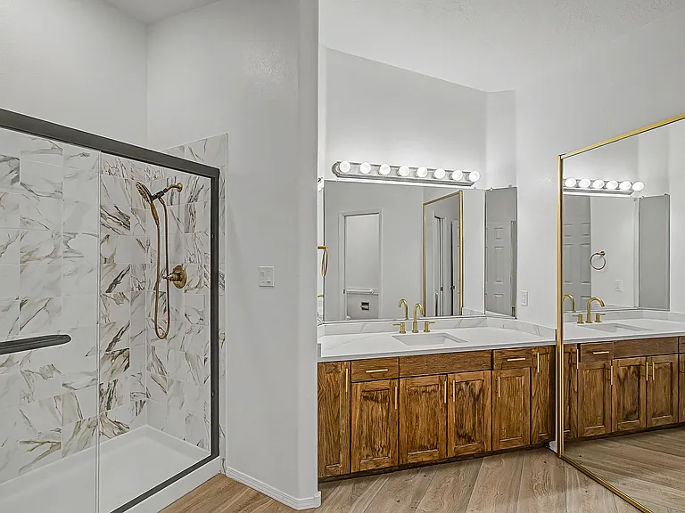 Primary bathroom with access to walk-in closet.