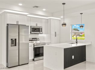 614 Ames St E, Lehigh Acres, FL 33974