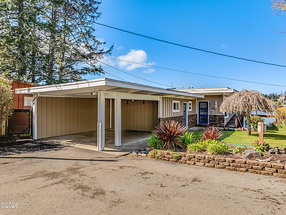 4th image of 1381 NE East Devils Lake Rd