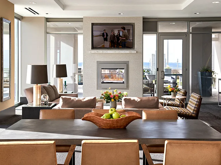 SkyLounge with ample seating, fireplace and TVs
