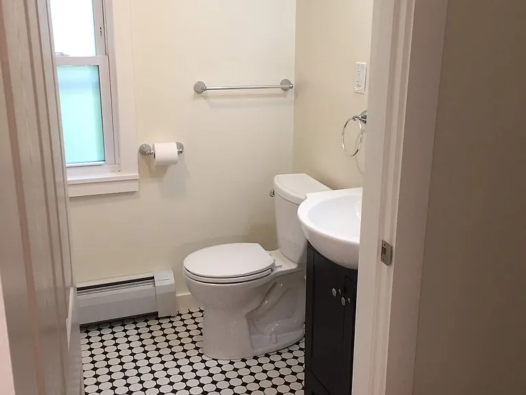 Bathroom. Full Tub and Shower. Tile Floor.