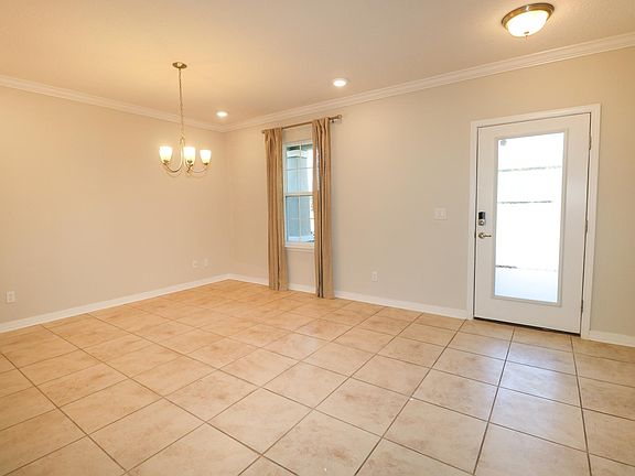 Front Door Enters Dining Room