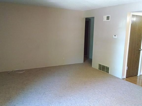 Spacious living room with fireplace