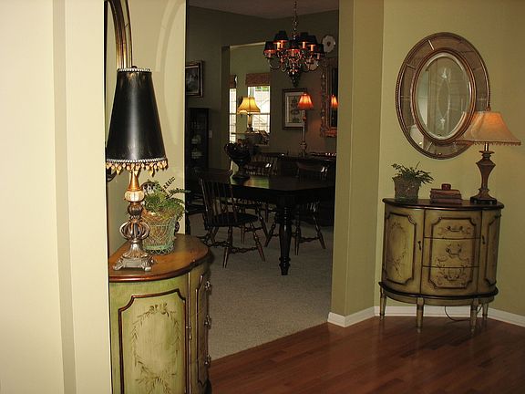 Enter the lovely foyer with hardwood floors!
