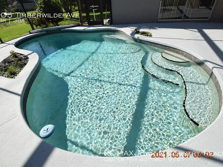 705 Timberwilde Ave — Photo 5