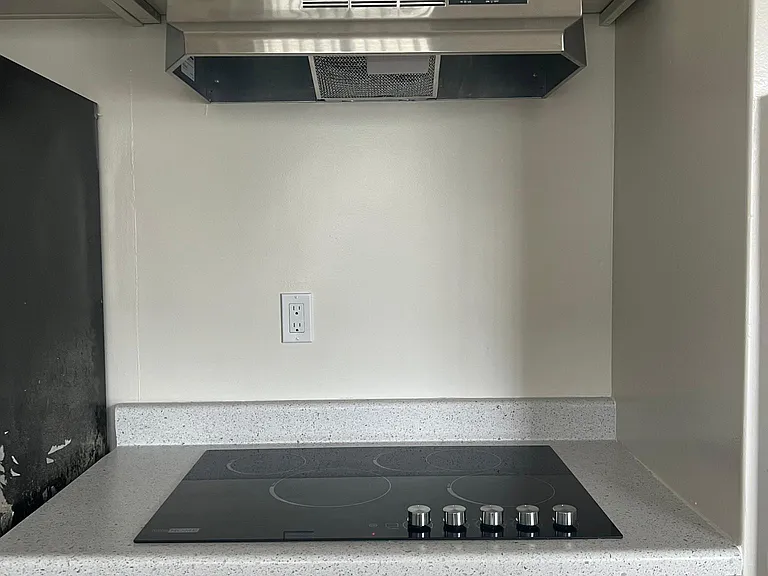 New electric stove and hood