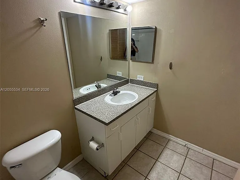 5035 Wiles Rd #203 — Photo 9