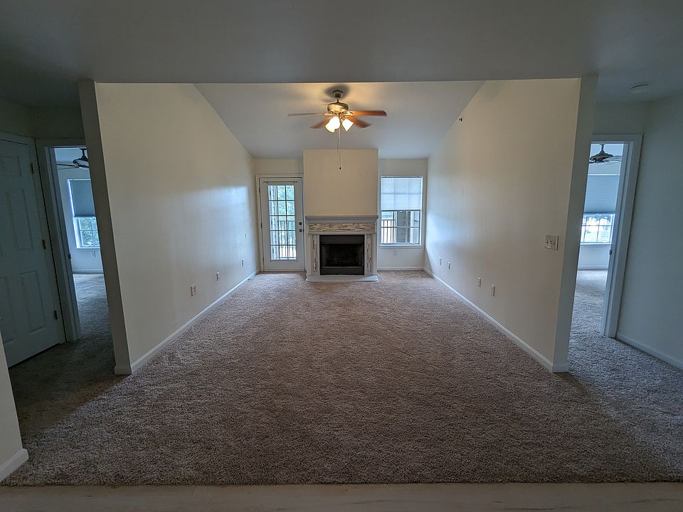 Main living area with fireplace and entry to porch area