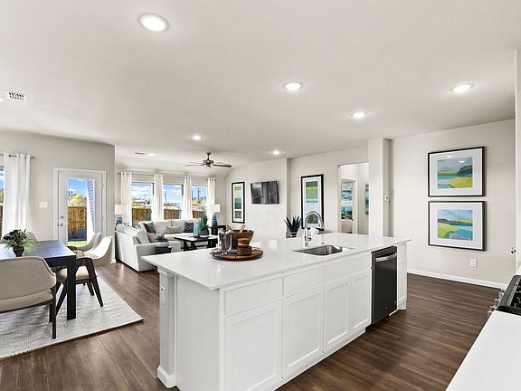 Open Floorplan in the Heisman home plan by Trophy Signature Homes - REPRESENTATIVE PHOTO